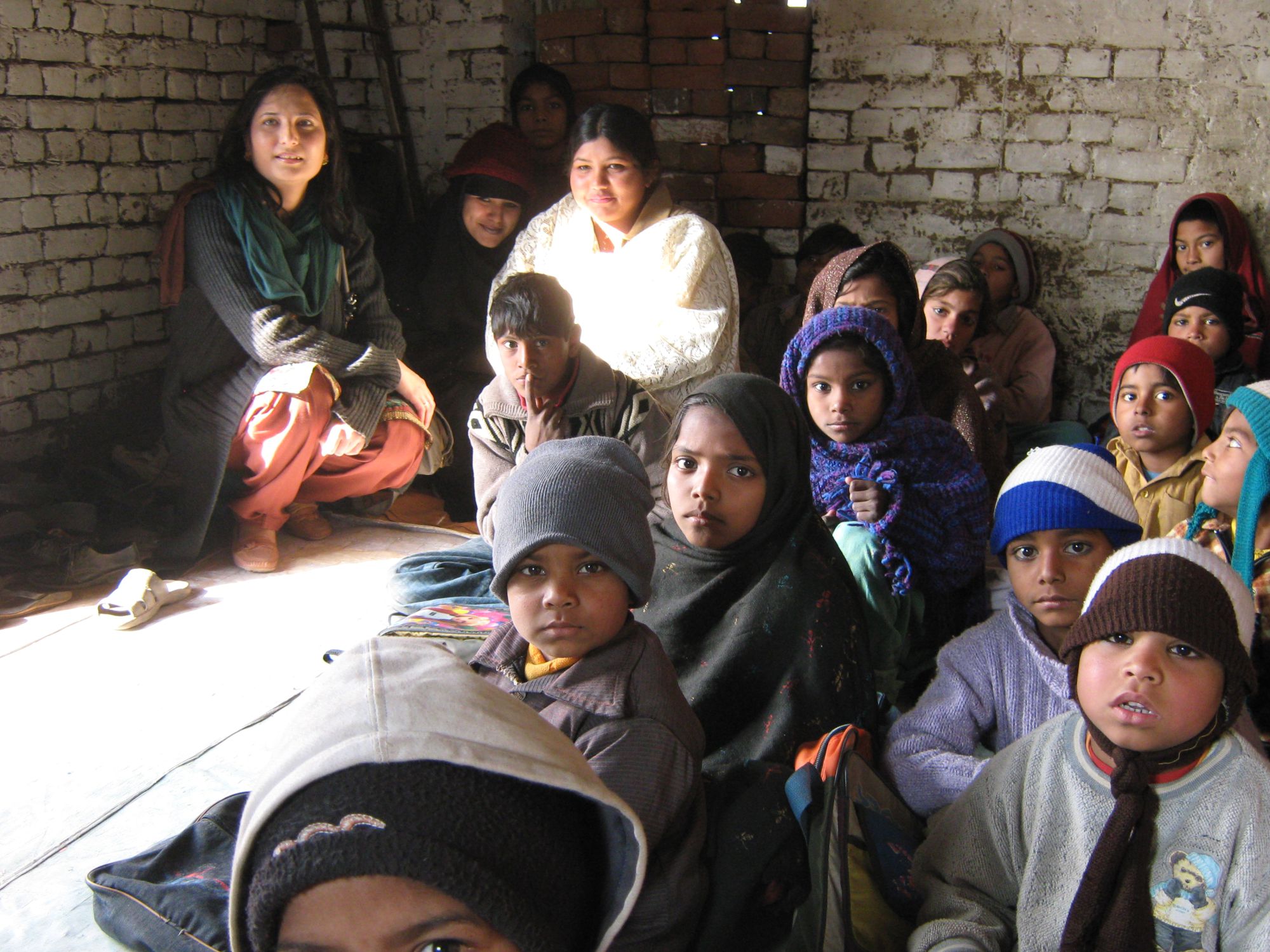 This is a starting school in a space provided by the brick kiln owner.